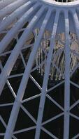 Aerial view of a lattice openwork structure consisting of semi arches. Stock footage. Modernism in architecture. video