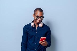 black african man using a mobile phone. photo