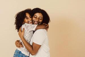 happy family of single mother and daughter together hugging. photo