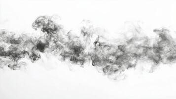 Ethereal gray smoke wisps swirling quietly across a white background photo