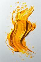 Bright yellow paint stroke on a white canvas creating a vivid, artistic expression photo