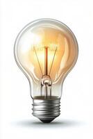 A glowing orange light bulb illuminating a soft background in a creative design concept photo
