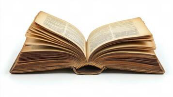 An old, opened book resting on a surface with visible aged pages and dark leather cover photo