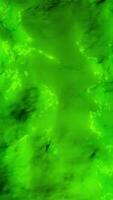 Top view of abstract wavy surface, ripples in the water of green color, seamless loop. Animation. Colorful glowing liquid substance. video