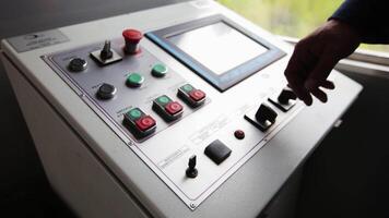 An Industrial Control Panel that features both a Touch Screen Interface and Physical Buttons. Stock Clip video