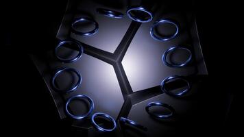 Black background with blue and gold rings. Design. Rotating in a circle small rings made in abstraction. video