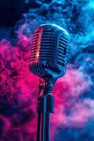 Vintage microphone surrounded by colorful smoke in a dramatic lighting setup photo