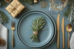 Elegant festive table setting with rosemary and sparkling decorations for holiday celebration photo