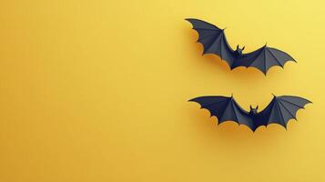 Bats flying against a vibrant yellow backdrop during Halloween-themed decorations photo