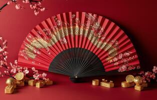 Elegant red fan with dragon design and gold decorations on a festive table setting photo