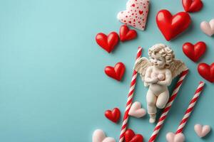 Charming Cupid surrounded by heart-shaped candies on a blue background for Valentines Day photo