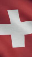 Flag of Switzerland. The Switzerland flag waving in the wind. Switzerland flag in loop mode video