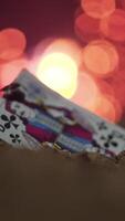 Games card Jack in the sand. Footage. Beetle crawling on card is Jack, fire on the background. Abstract playing card on ground. Old playing card Jack video