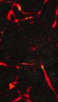 Abstract background with animation of burning fire or lava from cracks on stone surface, seamless loop. Abstract motion background of liquid magma. video