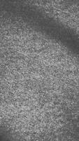 Background of beige gray fabric in the wind. Animated movement of the canvas. Neutral gray fabric background waving in the wind. Easy to colorize to any color desired. The waves of the material video