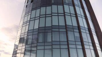 Top view of glass modern building with reflection. Stock footage. Beautiful reflection in glass facade of modern building. Glass height with landscape reflection video