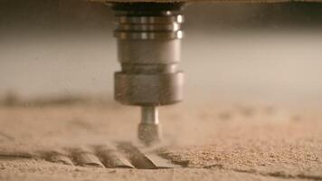 Extreme close up of cutting a pattern inside a wooden board with an automatic machine. Creative. Concept of carpentry. video