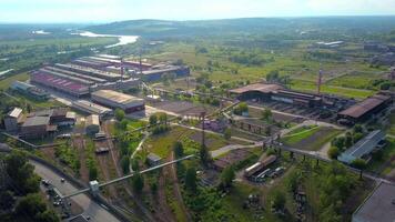 Industrial factory production area. Clip. Aerial view of an industrial zone on a summer day, aerial view. video