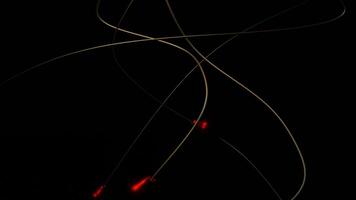 Black background with green and red lines. Design. Small illuminated animation circles move along thin stripes in the animation. video