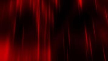 Dark background. Motion. Thin beams of red in the animation scatter slowly in different directions through the darkness. video