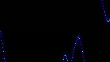 Abstract blue waves on a black background, Design. Fluctuating moving lines of tiny particles. video