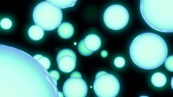Abstract spheres flying towards the camera on a black background. Clip. Blue 3D flying circles or bubbles in the dark. video