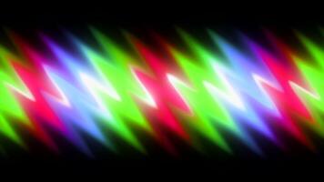 A distorted zigzag background that is moving on a black background. Motion. Blurred zigzag rainbow color stripes. video