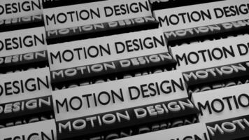 Motion design words written on black and white rotating tablets. Design. Spinning inscriptions motion design. video