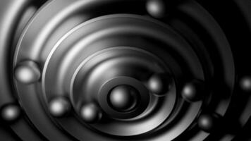 Small balls rolling through swirl maze viewed from top. Design. Relaxing background with moving spheres. video