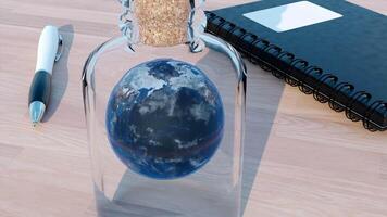 rotante terra globo dentro bicchiere bottiglia. design. surreale illustrazione di il pianeta su il tavolo, taccuino e un' penna. video