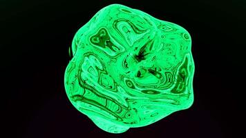 Black background. Design.Green blot in the animation that shimmers with a neon shadow and spins in different directions video