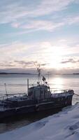 Timelapse of beautiful sky at dawn and boat on shore. Clip. Seascape of cloudy sky and dawn sun. Boat is standing on shore with view of sea dawn video