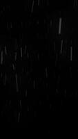 Abstract rain drops falling down on black background, seamless loop. Animation. Heavy rain, imitation of natural phenomenon. video