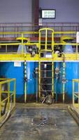 Boilers for raw materials in factory. Stock footage. Huge boilers for storing or mixing raw materials in factory. Inside modern raw material plant video