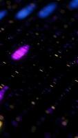 Abstract purple, blue, and yellow squares shimmer and move in rows on black background, seamless loop. Animation. Colorful signals flowing diagonally. video