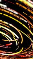 Endless spinning spiral of narrow colorful lines isolated on black background. Animation. Seamless loop abstract helix from many stripes rotating in the dark. video