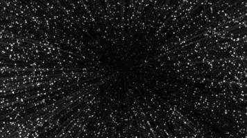 Black background. Motion. White stars in animation that scatter in different directions. video