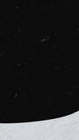 Abstract cartoon white and black waves with dust particles. Animation. Screen separated by two colors moving with stop motion effect, seamless loop, monochrome. video