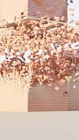 Abstract beige tower made from cubes is being ruined by small disk. Design. Geometric figure colorful abstraction falling apart into small pieces. video