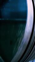Rotating tanks in factory. Stock footage. Rotating turbines and tanks for processing raw materials at plant. Large steel tank rotates stirring raw material video