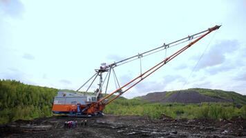 Tbilisi, Georgia - August 02, 2024. Heavy Machinery Utilized in a Remote Quarry Environment for Construction and Mining Activities. Stock Clip video