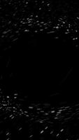 Abstract fast flight of stars in outer space crossing black wormhole, seamless loop. Animation. Cosmic background with a black hole and milky way on black background. video
