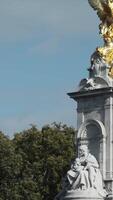 View from the bottom on Imperial Memorial to Queen Victoria located in front of Buckingham Palace. Action. National symbols of England video