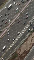 Aerial view of busy highway with traffic in the rush hour. Action. Multi lane road with many cars driving fast. video
