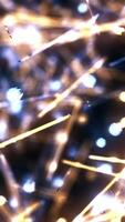 Abstract colorful neon lines with glowing defocused particles. Animation. Christmas theme, beautiful short lines with reflecting surface and shining spheres moving chaotically on black background video