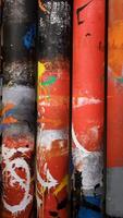 Close up of interesting composition with rotating tubes with bright paintings. Concept. Spinning columns, art object inside the modern art museum. video