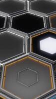 Abstract hexagons of different colors in rows, seamless loop. Animation. Close up of flat metal geometrical figures with colorful light lamps inside. video