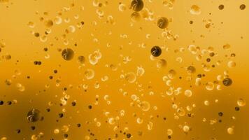 Abstract bubbles flowing chaotically on a colorful background. Motion. Small spheres floating in weightlessness. video