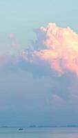 View of a passing ship near the sea shore. Shot. Beautiful view of the sea and clouds video
