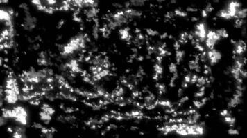 White and orange glow. Motion. Black background with 3d animation with bright sparkling highlights. video